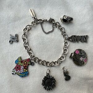 Small forged bracelet and charms
